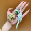 Regalos del Festival del Medio Otoño para Clientes: Pasteles de Luna, Bolsas de la Suerte, Dijes Dorados para Teléfono, Llaveros, Cadenas para Teléfono, Dijes para Bolsos