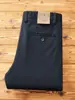 Nueva colección otoño e invierno 2026: forrados de polar, gruesos, texturizados, de sarga, elásticos, pantalones largos, de alta gama, corte holgado, pierna recta, pantalones casuales versátiles para hombre