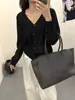 2025 Principios de Otoño Nueva Moda Cuello en V Un Botón Manga Larga Lino Corto Cardigan Tejido Superior Chaqueta Delgada Otoño