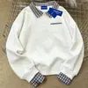 Sudadera de estilo académico con estampado de letras simple, efecto dos piezas, patchwork, para mujer, nueva moda otoño e invierno 2025, marca de tendencia, top para hombre
