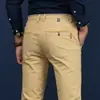 2017 Nuevo Llegada Pantalones Hombre Elásticos Combinan con Todo Casuales Hombre Negocios Ajustados Rectos Algodón Largos Juvenil Modernos