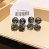 Pendientes de Flor Redonda con Circonitas y Tachuelas Negras, Estilo Europeo y Americano Fresco, Pendientes de Alta Gama