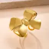 Anillo Popular Transfronterizo para Mujer, Anillo de Acero Inoxidable con Baño de Oro de 18 Quilates Moderno y de Alta Gama, Anillo de Acero de Titanio con Lazo Prensado en Aceite