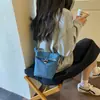 2026 Nova Bolsa de Celular Casual Versátil em Jeans Lavado Leve Tendência Bolsa de Ombro Único para Mulheres Bolsa Transversal de Grande Capacidade