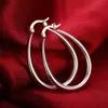 Pendientes lisos decorativos de plata de moda de eBay Amazon, pendientes creativos de Europa y Estados Unidos exagerados de comercio exterior, fabricantes al por mayor