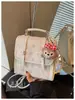 A mochila casual popular deste ano para mulheres 2026 nova estilosa simples leve para sair viagem pequena bolsa escolar