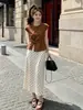Moda de verano estilo coreano top de camisa de manga corta con nudo retorcido y abertura en el dobladillo y traje elegante de lunares versátil para mujer