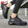 Sapatos Masculinos de Puxar 2026 Nova Coleção Primavera/Verão Versáteis Casuais Sapatos Masculinos de Couro Impermeáveis Tênis de Corrida Calçados Esportivos para Homens
