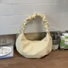 Bolso de Mano Elegante y Maduro de Diseño de Nicho para Mujer 2026 Nuevo Estilo Principios de Primavera Bolso Nube Versátil de Gama Alta