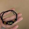 Pulsera de gato con cuentas de cuerda trenzada de color verano pulsera pequeña de alto nivel 2024 nuevos estudiantes accesorios dulces y geniales