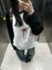 Camiseta casual de manga larga con bloques de color blanco y negro para mujer, adecuada para primavera y otoño, con mangas raglán, corte holgado y efecto adelgazante, perfecta como prenda básica para capas