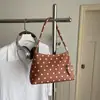 Bolso de mano de lunares estilo coreano, nuevo modelo otoño 2026, lindo, moderno, único, adecuado para ir al trabajo, bolso sencillo de axila