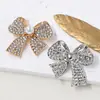 Nuevo Estilo Pin de Cuello Hebilla Anti-Exposición Broche de Lazo con Pedrería para Mujer Estilo Japonés Ins Tendencia Pin de Fijación Personalizado para Ropa Broche