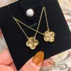 Collar de Trébol de Cuatro Hojas Hielo Triturado Dorado Edición Limitada de Año Nuevo Pulsera de Cinco Flores Doble Cara Escama de Dragón Hielo Triturado Suministro en Vivo