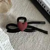 2025 Nuevo Pasador Negro para el Cabello Pinza de Tiburón Grande Elegante con Superficie AB Lazo Corazón Versátil