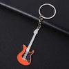 Llavero de guitarra con colgante de instrumento musical creativo, bolsa de regalo, pintura de metal, venta al por mayor transfronteriza