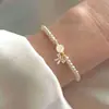 Aliexpress Produto Novo Design Simples Laço Coração Letra Pulseira Versátil Pequena Pérola Pulseira Joia para Mulheres