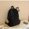 Mochila Pequena Estilo Preguiçoso Ins Coreano de Aparência Sofisticada Leve Cor Pura Simples Repelente à Água Mochila Casual para Viagem