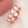Nuevo Anillo Transfronterizo de Comercio Exterior Simple Corazón Rosa Corazón a Corazón Anillo de Resina Hebilla de Oreja Accesorio de Regalo para el Día de San Valentín de Mujer