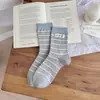 Calcetines lindos y dulces hasta la mitad de la pantorrilla, estilo fino de otoño con bordes rizados, etiqueta de tela floral estilo coreano, calcetines apilados a rayas para mujer