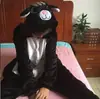 Lote mixto de nuevos pijamas de gato con queso para padres e hijos gato de Cheshire animal de dibujos animados enterizos ropa de casa para parejas gato blanco y negro al por mayor