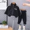 Moletom Novo Primavera e Outono 2024 Letra Masculino Bebê Puxar Manga Longa Gola Algodão Calça Moletom Longa Conjunto Duas Peças Meninos Atacado