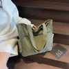 2025 Bolsa Tote Mais Vendida Novo Modelo Grande Capacidade Fashionável Tendência Leve Bolsa de Ombro Estilo Japonês Ins Simples Bolsa de Viagem