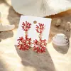 Pendientes de coral estilo océano con goteo de aceite rojo para mujer, nicho de Ins, sensación de alta gama, joyería de aleación para la oreja, foto de viaje junto al mar, moderno