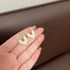 Brincos Super Fada Francesa Pequenos Frescos Doces Gota de Óleo Amor Moda Gentil Celebridade da Internet Luxo Leve Sensação Avançada Brincos Explosivos