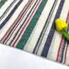 Sofá de algodón y lino con motas Tela de lino y algodón teñida en hilo con rayas a cuadros Tela de lino y algodón lavable Serie de manteles de tela para el hogar de lino y algodón