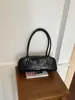 Bolsa de Ombro Francesa de Nicho Transfronteiriça Feminina Nova Moda Retro Baguete Bolsa de Mão de Ombro Único Elegante de Alta Qualidade
