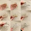 Pinzas para el cabello de alta gama para mujer para la parte posterior de la cabeza, exquisitas pinzas de garra de perla para el día a día, elegantes pinzas de tiburón para salir, venta al por mayor de artículos pequeños de Yiwu