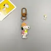 Chaveiro Criativo de Desenho Animado Snoopy Chaveiro Cachorrinho Charlie Bolsas Masculinas e Femininas Pequenos Pingentes Pequenos Presentes Atacado