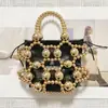 Bolsa Pequeña de Verano 2025 Nuevo Estilo Bosque Chica Suave Moda Hueca Pequeño Aroma Alto Grado Elegante Acrílico de Mano Tejida