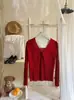 Suéter de punto de cuello redondo con mangas largas retorcidas de rayas verticales para otoño e invierno para mujer, principios de otoño, súper caliente, nicho, estilo único, top