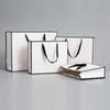 Bolsa de Papel Blanco Bolso de Mano de Cartón Blanco Venta al por Mayor Bolsa de Regalo Papel Tienda de Ropa Tienda de Juguetes Joyería Bolsa de Compras