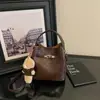 Moda Outono 2026 Elegante e Fashion Design de Nicho Bolsa de Mão Balde com Alça de Ombro Bolsa Transversal de Alto Valor para o Dia a Dia para Mulheres