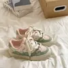 Zapatillas Blancas Casuales Versátiles de Diseño de Nicho de Alta Apariencia 2026 Verano Nuevos Zapatos de Lona con Cabeza de Gato Zapatillas Deportivas