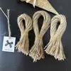 Cuerda de cáñamo amarilla de 1.5 mm al por mayor, 50 piezas por rollo, accesorios para ropa, etiqueta de papel kraft, accesorios a juego, cuerda en rollo