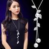 Collar largo de cadena para suéter con accesorios florales transfronterizos para mujer, colgante de borla de cristal, colgante para ropa, joyería simple al por mayor