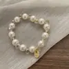 Pulsera de doble propósito ~ banda de goma de perlas de alta gama para el cabello de mujer, cuerda para la cabeza de alta elasticidad, duradera, nueva de alta gama 2025