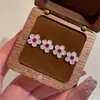 Nuevos Pendientes de Flor Pequeña Polvo de Flor Diamante Flor para Mujer Diseño de Nicho Modernos Dulces Elegantes Populares Pendientes de Fiesta