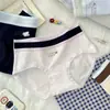 Calcinha feminina de algodão puro com blocos de cor fofa 2026 novo modelo cintura média 100% algodão entrepernas estendido respirável que cobre o quadril calcinha para jovem