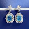 Mu Jing Jewelry 2022 Novo estilo europeu e americano S925 Brincos de prata Paraíba Brincos elegantes microincrustados