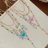 Collar de Verano con Flor de Dopamina de Múltiples Capas para Mujer 2026 Nuevo Accesorio Largo de Cadena para Clavícula de Gama Alta