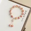Pulseira Floral Rosa de Cabaça e Sementes de Bodhi com Pingente de Gato da Sorte Fofo para Meninas, Pulseira de Contas Budistas Macia e Flexível