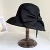 Elegante Sombrero de Pescador de Moda con Lazo para Mujer, Sombrero de Paja Versátil para el Verano con Protección Solar para Vacaciones y Viajes, Sombrero Cubo de Moda
