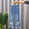 Jeans para Niña 2026 Primavera y Otoño Nuevo Estilo Pantalones Largos Elásticos Súper Suaves para Niños Pantalones Acampanados Elegantes para Niña con Adorno de Encaje