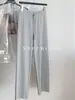 Pantalones cómodos, de tacto fresco, de tres colores tipo mantequilla con un diseño holgado, versátil, adelgazante, fino y de pierna recta, pantalones casuales de pierna ancha para el verano de 2026