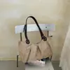 Bolso de mano de felpa y gamuza para mujer 2026 Nuevo Otoño Retro Bolso de hombro único Gran capacidad Maillard Viaje Bolso grande